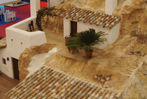Cave house set built indoors for exhibition stand